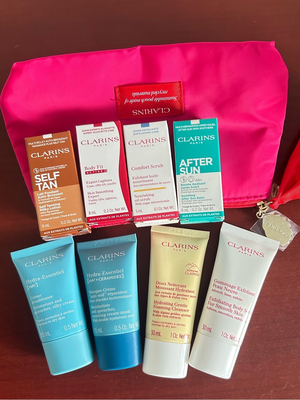 Clarins Pink Travel Pouch with Assorted Skincare set